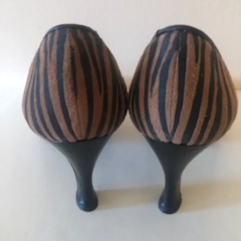 Fashion Influences Leopard print leather high heels. Size: 7.5